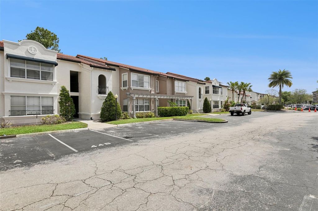 Photo of 5112 Conroy Road #311, Orlando, FL 32811 (MLS # O6395310)