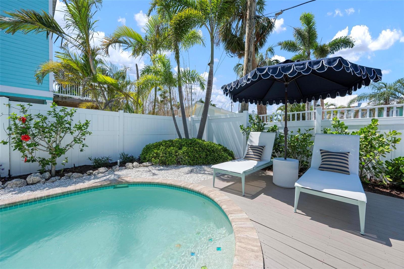 Stunning Turnkey Vacation Rental Home – Fully Renovated in 2025! Welcome to your dream investment or island retreat! This beautifully renovated both inside and out, this 3-bedroom, 2-bath home offers 1,777 sq ft of stylish living space on a generous 7,022 sq ft lot (90x78 ft). This beach house is just a 2-minute walk to the beach—perfect for catching stunning sunsets. Perfectly located in a weekly rental zone, this property can provide incredible rental income when you’re not here. Step inside to discover a comprehensive 2025 renovation, including all-new drywall, insulation, kitchen, bathrooms, appliances, AC ductwork, water heater, and more. Every detail has been considered, from the high impact windows to a new metal roof (2023), and a mold inspection report for peace of mind. Enjoy island living at its best with a heated pool heated by a new pool heater, new landscaping and irrigation, and a large garage—perfect for storing beach gear or your personal golf cart or creating a fun play area. Being sold fully turnkey furnished with all-new furniture and home décor ready for you to sit back and enjoy the island immediately. Additional highlights include a new washer & dryer with custom laundry cabinets, new bathroom vanities, a new comprehensive AC system, and the elegant new kitchen has all new appliances and stylish cabinets. The exterior has a new fresh coat of paint to go along with lush landscaping and outdoor furniture to enjoy the beautiful weather.
Whether you're looking for a personal getaway or a high-performing vacation rental, this property has it all. Don’t miss this rare opportunity to own a completely updated, income-producing home in paradise!