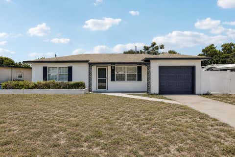 Photo of 104 E Grapefruit Circle, Clearwater, FL 33759 (MLS # TB8522282)