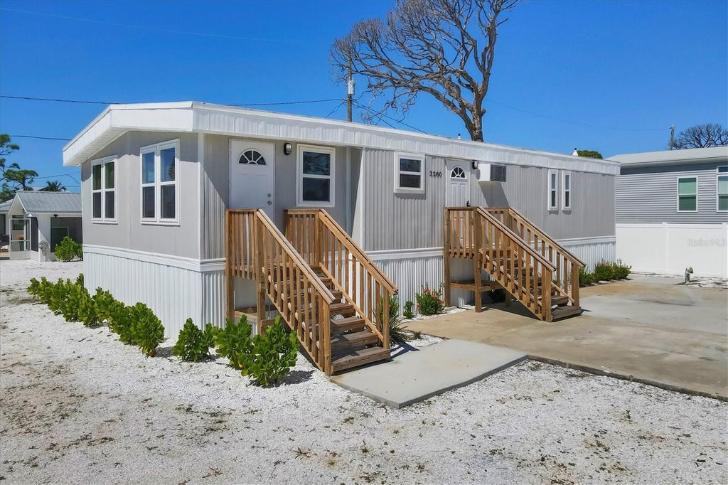Photo of 3280 Holly Avenue, Englewood, FL 34224 (MLS # D6148656)