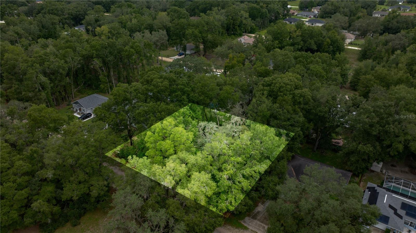 *Spacious .43-Acre Homesite in Rolling Ranch Estates - 2 Blocks from HWY 484* This oversized lot offers flexibility and opportunity. With the potential to possibly SPLIT INTO TWO LOTS, you can build your dream home with extra space, hold part as an investment, or possibly build two homes. The property sits across from a dry retention area, providing added privacy, and a more open feel.
Conveniently located just 2 blocks from HWY 484, you'll have easy access to SR 200 shopping, dining, and medical facilities, while still being a short drive to the Rainbow River for outdoor recreation. Whether you're looking to build now or plan for the future, this homesite offers both value and versatility.