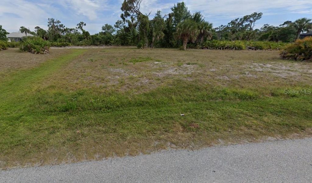 Photo of 167 Broadmoor Lane, Rotonda West, FL 33947 (MLS # W7870227)
