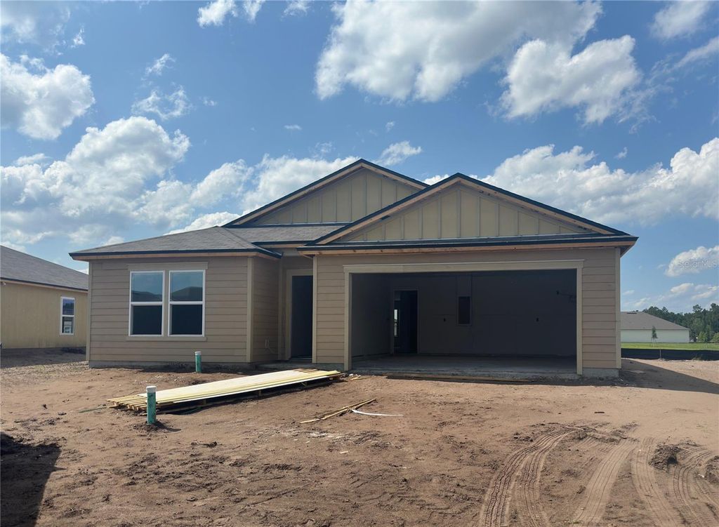 Photo of 65 Hulett Woods Road, Palm Coast, FL 32137 (MLS # FC300475)