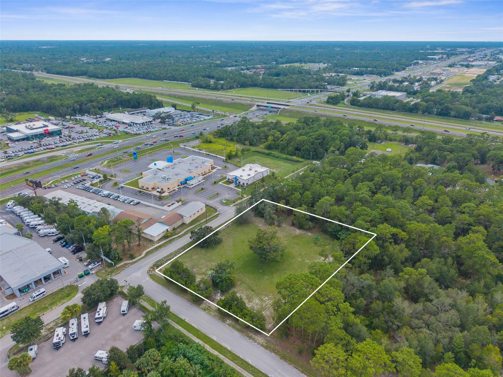 COMMERCIAL CORNER LOT FOR SALE. C2 ZONING. Located VERY close the Suncoast Parkway. Lot is 294' x 223'. Already cleared, level, and NOT in a flood zone. It's a large corner lot for easy access from both roads to give you pull through traffic for turning around.
Directions: from the Suncoast Parkway, go east on Hwy 50.Cortez. Go left at the first stop light, take your first left onto Horn. Property in located at the NW corner of Horn and Fall Street.
Great zoning for just about any business. Close to everything. Call today for more information or to make this the home for your business!