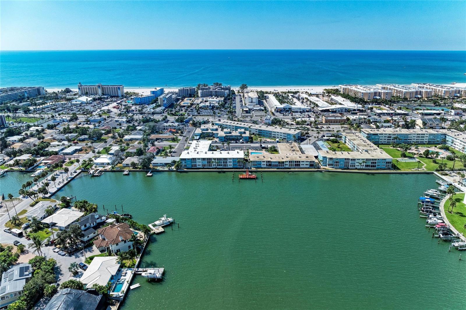 Imagine waking up to the salty breeze drifting through your window, the sound of waves crashing just across the street, and your morning coffee waiting for you while sitting at the resort pool overlooking the bay — welcome to your perfect beach escape in St. Pete Beach, one of Florida’s most vibrant coastal communities.
This beautifully updated second-floor condo offers the best of both worlds: peace of mind from being high and dry (no flood impact) combined with unbeatable access to the sand, surf, and sunshine. Inside, you’ll find a bright, open floor plan that makes the most of every square foot, ideal for both everyday living and entertaining. The kitchen has been tastefully updated with modern finishes, granite counters, and plenty of storage — perfect for preparing meals before heading out for an afternoon by the water.
Whether you’re looking for a seasonal getaway or an income-producing investment, this property checks every box. Its prime location directly across from the beach makes it highly desirable for vacation renters and snowbirds alike.
The complex itself is packed with resort-style amenities, including a resort pool, shuffleboard courts, BBQ and lounge areas, and beautifully maintained tropical grounds. There’s also dock access with slips available for rent, perfect for boaters and fishing enthusiasts.
Enjoy the laid-back, walkable lifestyle that makes St. Pete Beach famous — with top-rated restaurants, boutique shops, live music, and local entertainment just steps from your door.
Whether you’re investing in Florida’s thriving coastal market or finding your personal place in the sun, this condo delivers exceptional value and an unbeatable location. Experience beach living at its best — without the million-dollar price tag.