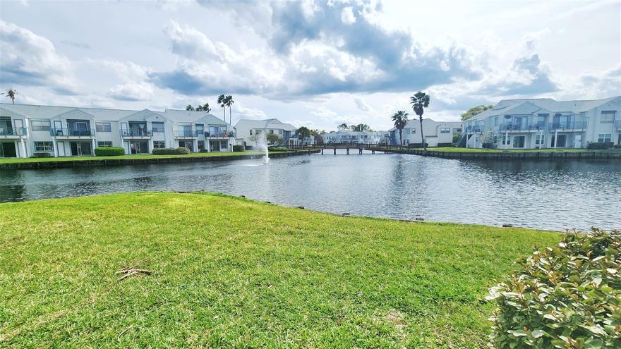 Waterfront Condo in Orlando - Perfect First Floor Living, PRICED TO SELL.  Fully Remodeled in 2024 (New Roof, Plumbing, HVAC, Electrical). Move in ready! 2-bedroom, 2-bath in a thoughtfully designed Open Floor Plan.  The Kitchen features modern Quartz countertops and New Stainless-Steel Appliances - perfect for preparing meals with ease. Throughout the home, you'll appreciate the hard flooring and high ceilings that create a spacious feel. Both bathrooms showcase attractive Quartz countertops for a consistent, contemporary look. One of the best features? The covered back porch overlooks Water Views, providing a peaceful spot to relax after a busy day. The inclusion of ceiling fans throughout helps keep the space comfortable in Florida's climate. Being on the first floor means Easier Access - No Stairs to navigate with groceries or belongings. Location is a Major plus here. Conveniently situated near Orlando International Airport (MCO), UCF and Downtown Orlando, this location offers exceptional access to everything in the city. The unit also comes with one Assigned Parking and plenty of Guest Parking spaces for added convenience.  This property is ideal for owner occupant or investors looking for solid consistent returns. Dockside Community offers Clubhouse with Pool, Fitness Room, Tennis court, Laundry, BBQ area, Carwash area, Board walk around the ponds and several green areas with Water Views and fountains. Ready to see this waterfront condo for yourself? Contact us today to schedule a viewing, this listing will not last long!!!