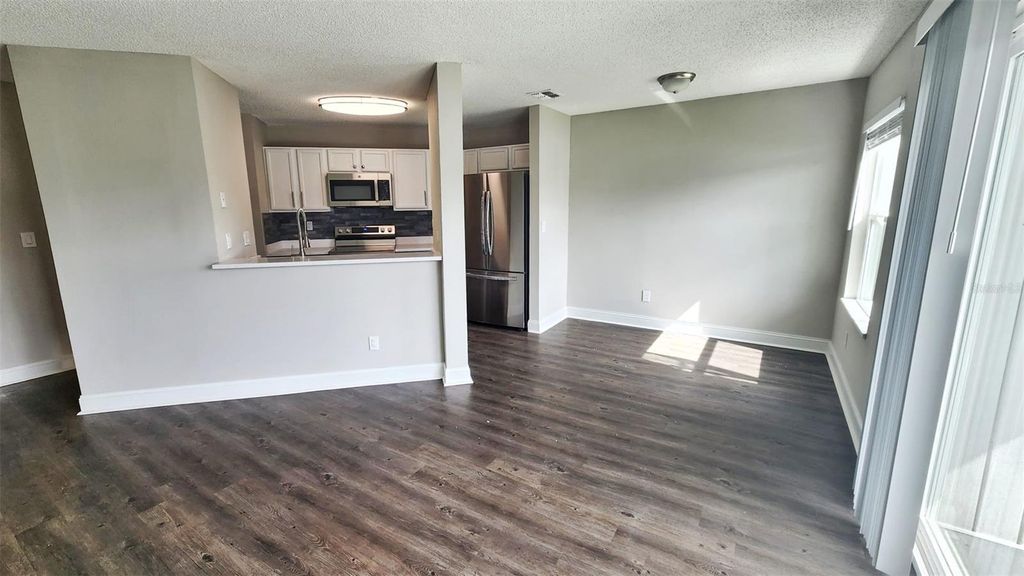 Photo of 2528 Woodgate Boulevard #102, Orlando, FL 32822 (MLS # O6402359)