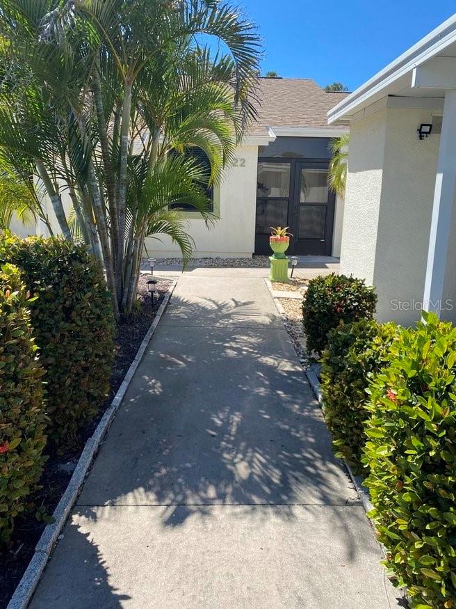 Very pretty condo in sought after Village at Wildflower Country Club. This is a 55+ maintenance free community. Just sit back and enjoy! The lanai has a small garden and looks out onto the preserve, so lots of wildlife to watch and no neighbors behind! Home comes with a covered carport and storage room. Also off street parking space. The living room dining room combination has sliding glass doors to the lanai. Main bedroom has a door to the lanai. Inside laundry with built in cabinetry and water heater.. The community pool is close by. Located in one of Southwest Florida's best kept secrets and minutes to area beaches, shopping, golf courses and great restaurants.