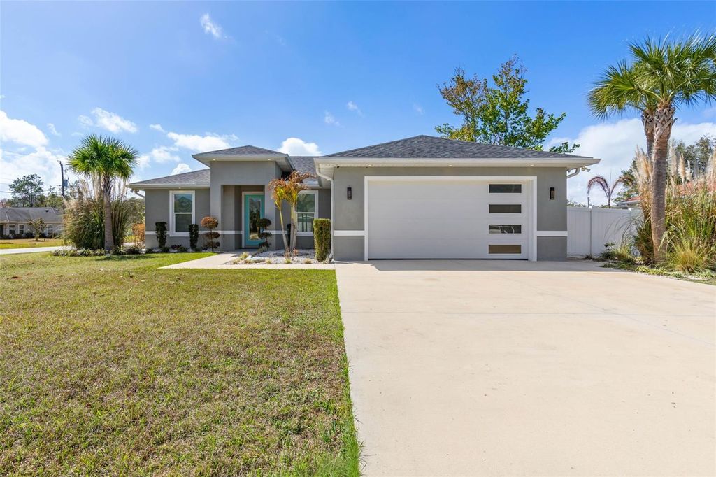 Photo of 1 Zeidler Place, Palm Coast, FL 32164 (MLS # FC316470)