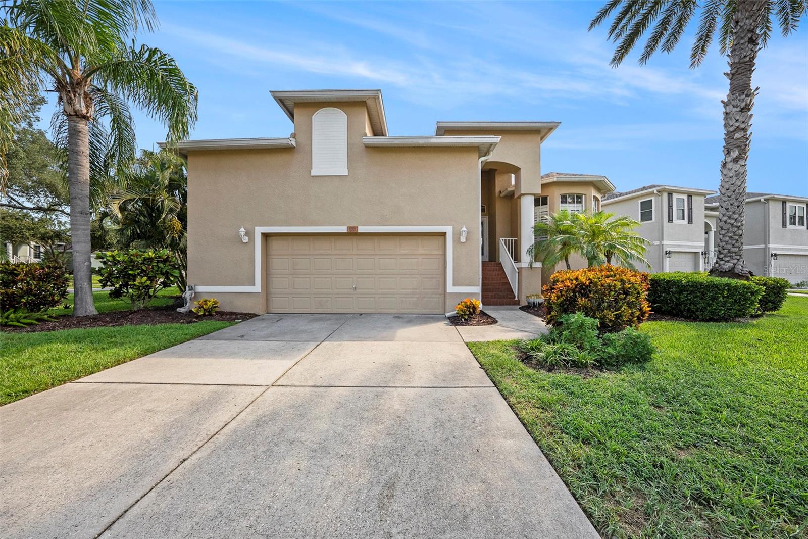 Welcome to this dream elevated three bedroom, two bath home, a true coastal oasis in the heart of Tarpon Springs. This stunning home is perfectly positioned on a spacious corner lot surrounded by beautiful and meticulous landscaping & highlighted by a gorgeous pond view that captures the essence of the coastal lifestyle of the residents of Pointe Alexis South Subdivision. As you step through the front door, you'll be greeted by how open and spacious the home is with its glowing hardwood floors, surrounded by windows for amazing natural lighting and Plantation shutters throughout. The large kitchen with granite countertops flows seamlessly to the dining and living areas and is the true center and heart of the home. The master bedroom is a suite complete with an en-suite bathroom including jacuzzi tub and large professionally designed California walk-in closet system. The other two (2) bedrooms are large with a 2nd full bathroom. And, this home has an oversized garage with ample storage. Pointe Alexis is a deed restricted community offering luxury amenities at low HOA rate that includes clubhouse with pool, water, cable, internet service, full landscaping and lawn care for every home, pest control, and more! As a real gem, this home comes with a Transferable FEMA Insurance that is approximately $900 annually! This home has it all!!! Act fast as it will not last long!
