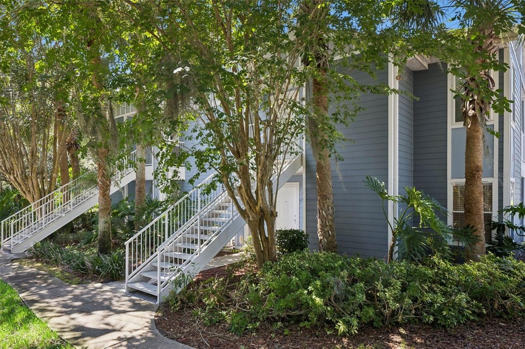 Photo of 2532 Grassy Point Dr #100, Lake Mary, FL 32746 (MLS # O6413712)