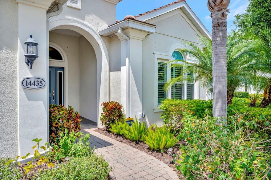 Located behind the gates of Country Club East, this maintenance-free lakefront home offers peaceful water views, hurricane-rated windows and doors, and an open-concept floor plan designed for comfortable Florida living. This 3-bedroom, 2-bath, 2-car garage home features 10-foot ceilings, plantation shutters, granite countertops, stainless steel appliances, breakfast bar seating, a casual dining nook, and a separate formal dining area ideal for entertaining. Enjoy relaxing sunset views from the spacious screened lanai overlooking the lake. One guest bedroom features bamboo flooring and double entry doors, making it ideal for a home office, den, or flex space. The primary suite offers dual vanities, a large walk-in shower, and generous closet space. A dedicated laundry room and garage utility sink add everyday convenience. Lawn care and irrigation are included for easy maintenance-free living. Residents enjoy access to three community pools, a fitness center, clubhouse, recreation center, billiards, sand volleyball, and a resort-style pool located just a short walk away. Optional golf and social memberships are available. Conveniently located near shopping, dining, medical facilities, top-rated schools, and the amenities that make Lakewood Ranch one of the nation’s top-selling master-planned communities, with easy access to Downtown Sarasota, Lido Key, and Siesta Key.
