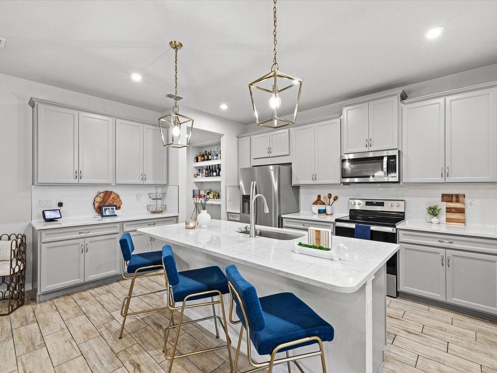 Photo of 19421 Blue Pond Drive, Lutz, FL 33558 (MLS # O6364788)