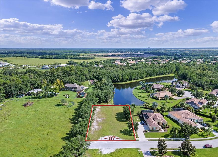 Don’t miss this exceptional opportunity to own one of the last remaining ½+ acre waterfront lots in the prestigious Rye Wilderness Estates. Perfectly situated at the end of a dead-end street, this incredible property offers expansive water views and conservation to the west, creating a private and serene backdrop for your custom dream home. With ample space to design a sprawling estate-style residence, the lot easily accommodates expansive outdoor living areas, a resort-style pool, and a spacious 3-car (or larger) garage—all while maintaining generous yard space. Buyers have the flexibility to choose their own builder, and custom home builder recommendations are available upon request. Rye Wilderness Estates is renowned for its estate-sized lots, high-end custom homes, and community charm that preserves long-term value. Enjoy the peace of a low-density neighborhood with no CDD fees and low HOA dues, all while being just a short drive to top shopping destinations like UTC Mall and Ellenton Outlets, premier dining, the Manatee River, State Parks, and Gulf Coast beaches. Build your forever home in one of the most desirable communities in the region!