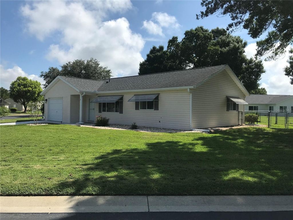Photo of 11879 SW 137th Loop, Dunnellon, FL 34432 (MLS # OM704916)