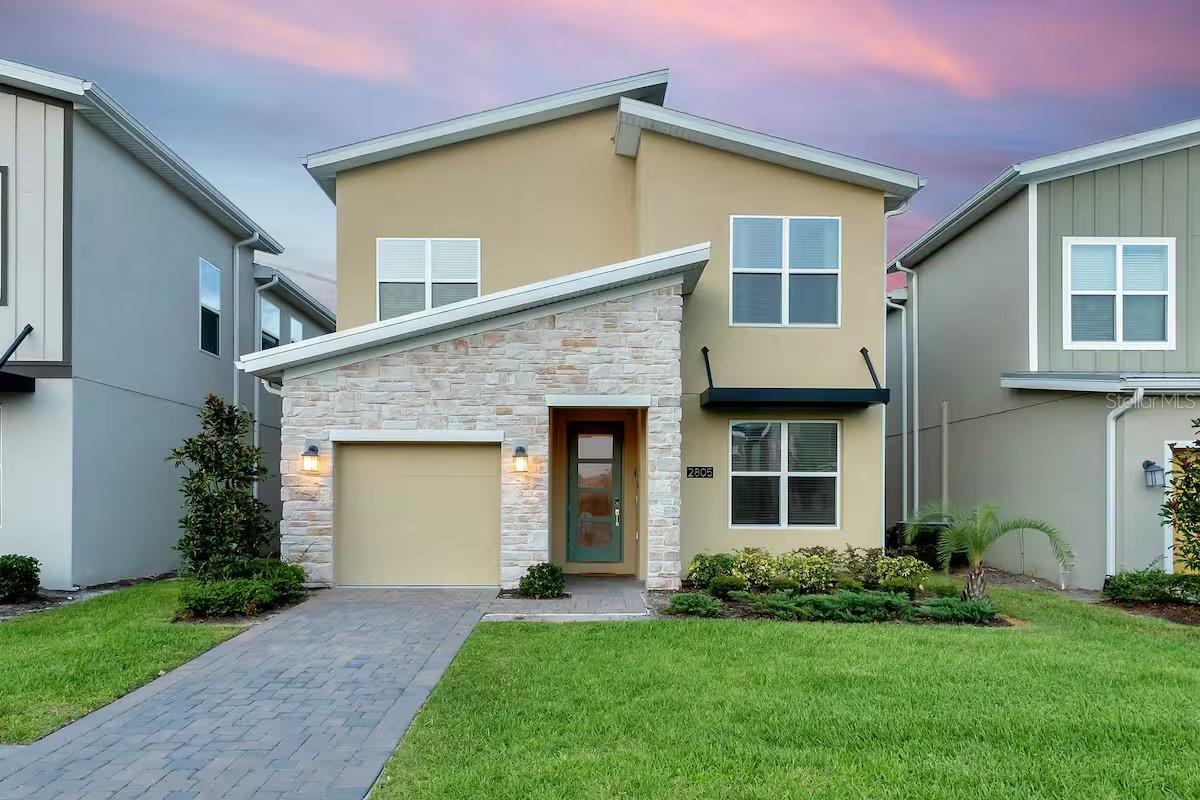 Welcome to 2805 Bookmark Drive, a beautifully furnished 6-bedroom, 5-bath retreat in the heart of the acclaimed Storey Lake Resort. Designed for both comfort and style, this luxury home offers the perfect balance of relaxation, entertainment, and convenience just minutes from Disney and Orlando’s best attractions.
Step inside to find a bright, open floor plan with elegant finishes throughout. The modern kitchen features quartz countertops, stainless steel appliances, and a spacious island that is perfect for family meals or hosting guests. The living and dining areas flow naturally toward the private screened patio where you can relax by the sparkling pool and spa with peaceful water views and no rear neighbors.
Two primary suites, one upstairs and one downstairs, each feature their own en-suite bath for added comfort. Themed bedrooms bring fun and imagination to life with creative Toy Story and Harry Potter designs that kids and adults alike will love. The upstairs layout also includes three additional full bathrooms plus a versatile enclosed loft that serves as the sixth bedroom.
Additional highlights include a first-floor laundry room, a game room in the garage, and plenty of space for large groups. Storey Lake Resort’s amenities are among the best, featuring multiple clubhouses with resort-style pools, lazy rivers, fitness centers, tiki bars, water slides, mini golf, and playgrounds.
Offered fully furnished and turnkey, this exceptional home is ready for your personal use or as a high-performing short-term rental investment. Experience the best of Kissimmee resort living and make 2805 Bookmark Drive your own piece of Florida paradise.