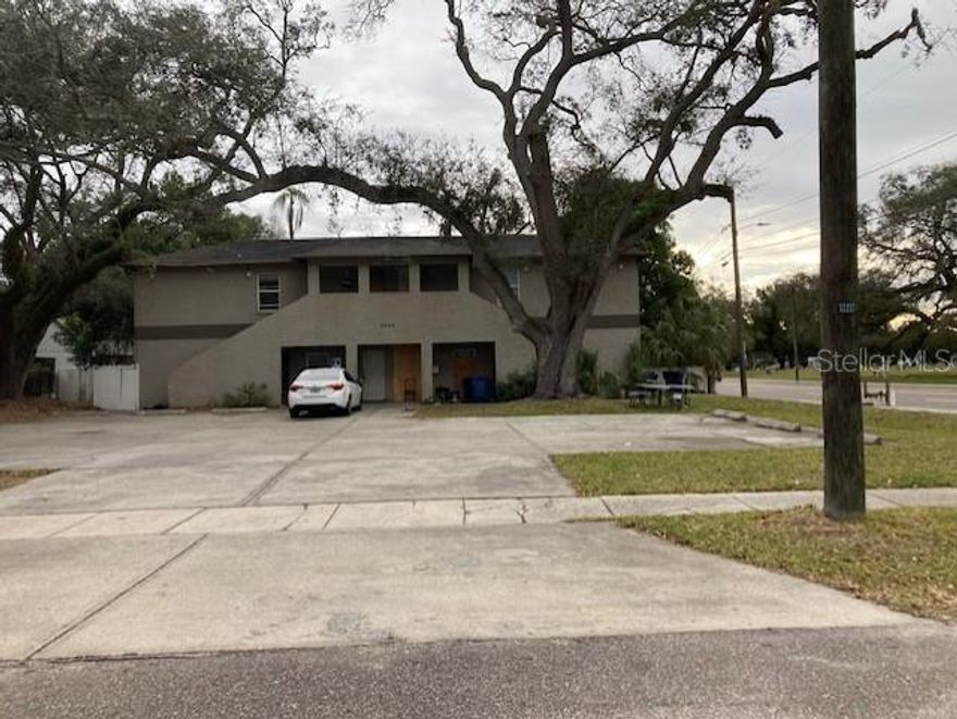 Four unit apartment building -Block construction (1999) - Large concrete parking pad - Fire sprinkler system - 2 bed / bath units - 1 unit needs renovation prior to occupancy as it served as a community room / laundry facility - Great opportunity for an investor or owner/occupant. Show by appt only.