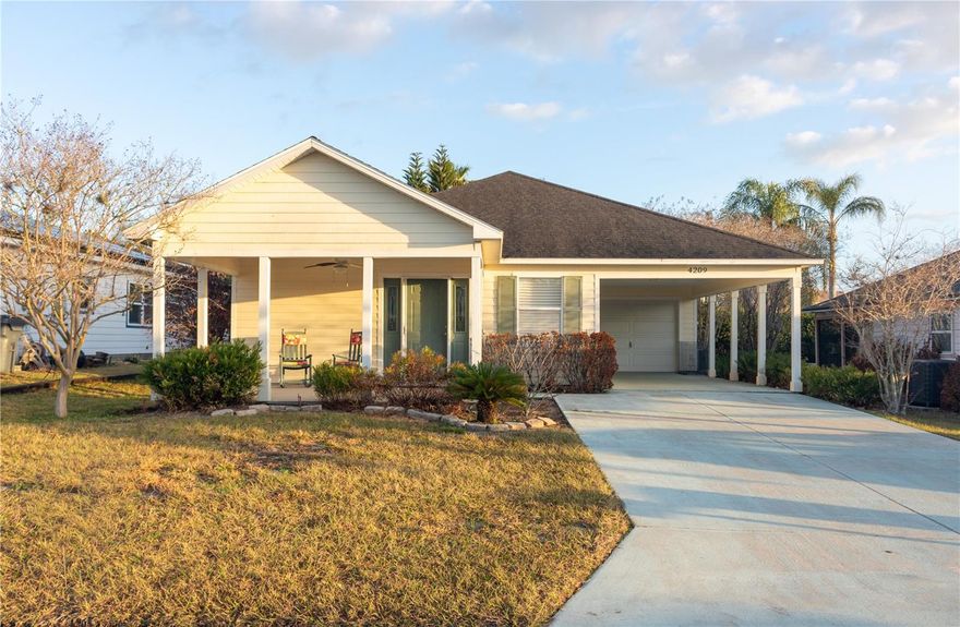 **Ready to Slow Down and Savor Life?**

Welcome home to easy living in the 55+ community of Nature’s Edge, where peaceful mornings and relaxed evenings are part of everyday life.

This beautifully built 2-bedroom, 2-bath Central Florida home offers the perfect blend of comfort and convenience. Just a few miles away, you’ll find some of the area’s best outdoor experiences. Enjoy lakeside dining at the beloved Cherry Pocket Steak & Seafood, known for its laid-back Old Florida charm. Or spend the afternoon wandering the breathtaking grounds of Bok Tower Gardens, where stunning gardens and the iconic Singing Tower create a truly unforgettable setting — maybe even stay for a concert.

AS you enter notice the custom made stained glass panels framing the entry door. Inside, the thoughtful layout makes everyday living effortless. The kitchen is both beautiful and functional, featuring solid surface countertops, warm wood cabinetry, and plenty of space to gather. An inside laundry room adds extra convenience.

The spacious primary suite is a true retreat, complete with an oversized walk-in closet and room to unwind at the end of the day. A one-car garage plus an additional carport provide plenty of parking for you and your guests.

And the covered front porch? That might just become your favorite place — perfect for morning coffee as the sun rises or a quiet glass of wine as the day winds down.

Lots of storage throughout home. Closets located in the kitchen and hallway.

This isn’t just a home — it’s the lifestyle you’ve been waiting for.