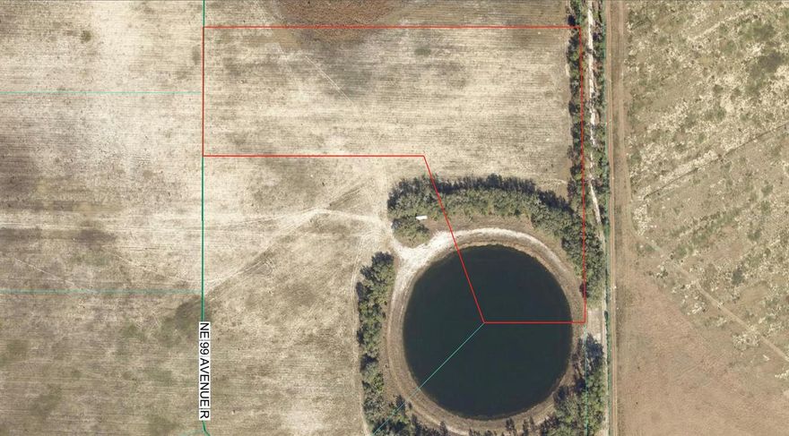 10.19 acres cleared land • Shared pond access • A1 zoning (mobile homes allowed) • No HOA

10.19-acre vacant land parcel in Citra with open, buildable space and shared pond access. Cleared and mostly level with wide horizon views and minimal tree coverage, offering flexible site placement for a custom or manufactured home. Zoned A1 agricultural with no HOA and minimal deed restrictions. Electric available nearby; well and septic needed. Located outside the flood zone (Zone X). Private, gated access via private dirt road from a paved road. Shared pond with two adjacent parcels provides a water feature and additional outdoor use potential. Rural setting with proximity to area lakes and springs. Approx. 30 minutes to Gainesville and access to major north-south corridor via US-301.