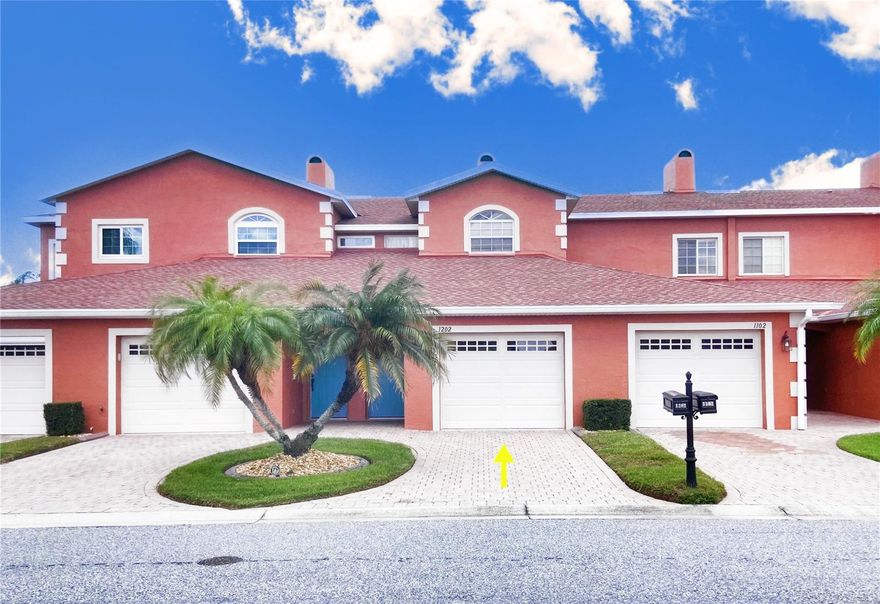 One or more photo(s) has been virtually staged. BEAUTIFUL CONDO WITH GOLF COURSE AND WATER VIEWS and WATER FRONTAGE! SELLER MOTIVATED!  This spacious 2-bedroom, 2-bath condo is located in Lake Ashton, Central Florida's Premier 55+community.  Spanning 1,436 sq ft, this bright and airy residence with new luxury vinyl floors and new interior paint boasts stunning golf course and water views from the LR, Primary Bedroom, Kitchen and Lanai. The open plan features a large living room with triple sliders to a private screened lanai, a designated dining area, and kitchen with breakfast/snack bar. The luxury vinyl floors, neutral cabinets and abundant light throughout this home is calming and inviting.  A full-size washer and dryer add convenience to everyday living in this condo. The kitchen has a large window over the sink that overlooks the Palms of Lake Ashton. The abundance in counter top space and cabinets in the kitchen is a huge a bonus.  The Primary Suite is located on the back of the condo and offers a beautiful water view, two (2) walk in closets and spacious primary bath with LARGE walk in shower, linen closet and comfort height vanity. The guest bedroom is located on the front of the condo and the guest bath with shower/tub combo, comfort height vanity is attractive and conveniently located. Enjoy the breeze on the screened lanai, overlooking panoramic water and golf course views. You'll enjoy your very own garage and additional storage closet inside of the garage space. Your mailbox is at the end of your driveway.  Nestled in a beautifully landscaped community, residents enjoy exclusive amenities, including a large clubhouse with outdoor heated pool, bowling lanes, fitness center, restaurant, grand ballroom, card, craft and billiards and MORE.  Additional perks include a Health and Fitness Center with large heated indoor pool, indoor 1/2 court basketball, indoor racquetball, pickle ball courts, tennis courts, card, craft and billiards, fitness center and MORE.  Perfectly located minutes from shopping, restaurants, medical facilities and entertainment. Ideal for buyers or investors, this condo is a blank canvas ready to be transformed into a modern dream home. Virtually staged photos provide inspiration for its endless potential. Make an Appointment to tour this beautiful condo today!