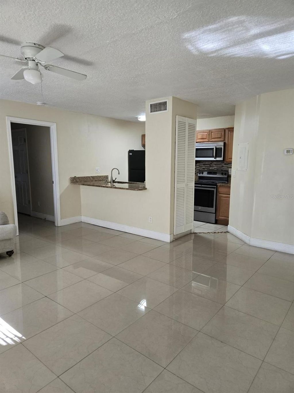 Photo of 4756 Walden Circle #11, Orlando, FL 32811 (MLS # S5145297)