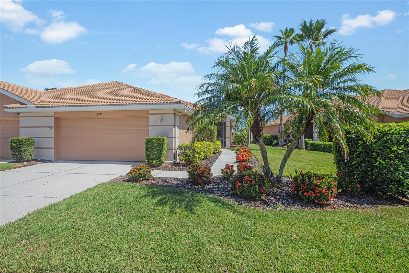 Exquisite luxury living awaits in the planned development of Heritage Harbour in East Bradenton. This impeccably designed villa, located in the gated community of Stoneybrook at Heritage Harbour, offers breathtaking water views and a serene spa for ultimate relaxation. This model-like 2-bedroom, 2-bathroom residence with den, 2-car garage and expansive extended lanai is beautifully appointed with custom designer touches throughout, creating a stylish and welcoming atmosphere. The open-concept interior offers an ambiance of modern elegance, ideal for both relaxation and entertaining. This home offers not only outstanding features but also an enviable lifestyle. Stoneybrook boasts community pools, tennis & pickleball courts, clubhouse and a state of the art fitness center. The Heritage Harbour development also includes an array of expansive resort-style amenities, including the Heritage Harbour Golf Club with restaurant, athletic fields and park facilities. The development also includes The Marketplace at Heritage Harbour – a retail, dining and entertainment mecca anchored by Costco, Target, Seasons 52 and other popular dining venues. This villa epitomizes the ultimate in luxury, convenience and maintenance free Florida living. Is it your time to experience Florida living at its finest? Schedule your showing today!