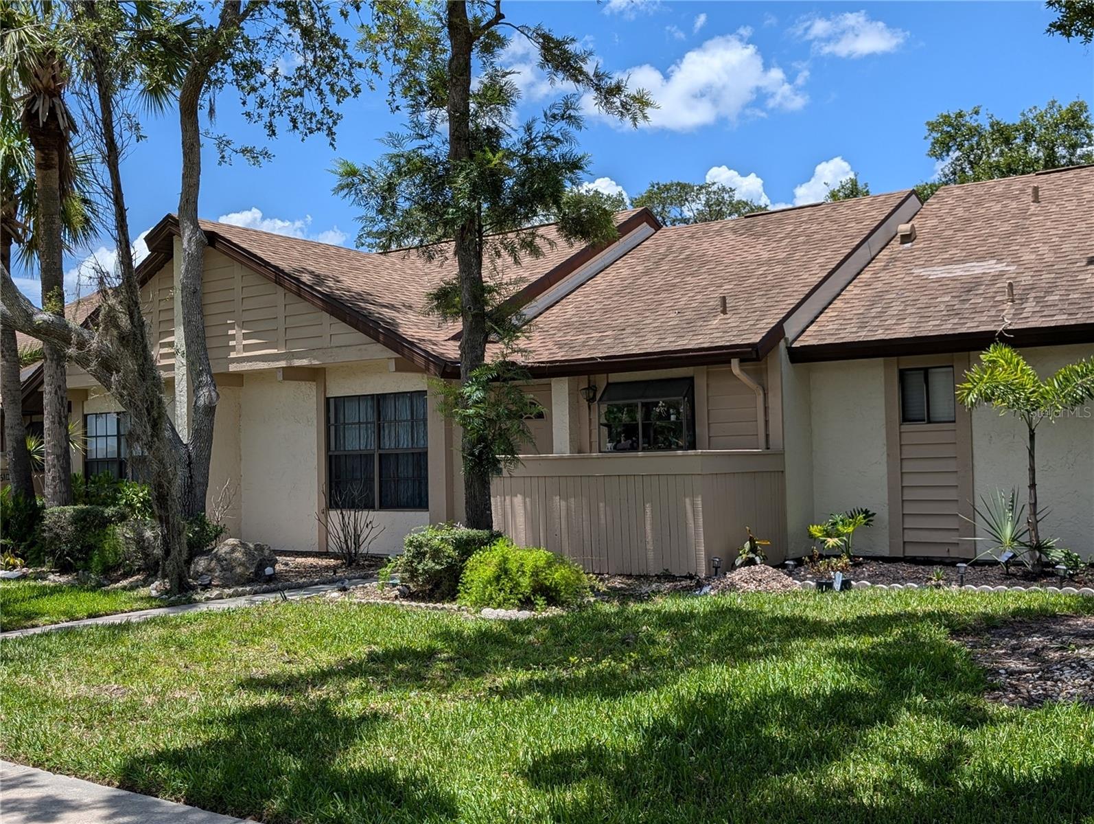 Easy Living Awaits – Ideal Villa for Retirees in Peaceful North Port Community
Enjoy the freedom of low-maintenance living and the warmth of the Florida sunshine in this inviting 2-bedroom, 2-bath villa, perfectly situated in the friendly Fairway Villas community of North Port. Designed with comfort and simplicity in mind, this home offers a relaxed lifestyle that’s perfect for retirees seeking either a year-round residence or a seasonal getaway.
Step into a bright, open great room featuring soaring cathedral ceilings with charming wood beam accents. Sunlight pours in through large windows, creating a cheerful and welcoming space—ideal for quiet mornings, afternoon card games, or evening visits with friends and family.
The thoughtfully planned kitchen is just the right size, featuring Quartz countertops, quality wood cabinetry, and a breakfast bar. Whether you're preparing a home-cooked meal or a light snack, everything you need is within easy reach.
Start your day or wind down in the screened lanai overlooking a serene partial lake view. It’s the perfect place to sip your morning coffee, enjoy a good book, or simply take in the gentle breeze and beautiful landscaping.
Surrounded by mature oak trees and lush greenery, the setting feels peaceful and private—like your own little slice of paradise.
Fairway Villas is a quiet, well-maintained community with a neighborly spirit and low HOA fees. Located just minutes from grocery stores, medical facilities, dining, and more, everything you need is close by. Easy access to U.S. 41 and I-75 puts you within reach of Gulf Coast beaches, golf courses, nature parks, and top destinations like Wellen Park and CoolToday Park.
Whether you're looking to downsize, simplify, or just enjoy more of what matters most, this charming villa is an excellent choice for your next chapter. Come see it today—and start living the relaxed Florida lifestyle you’ve earned.