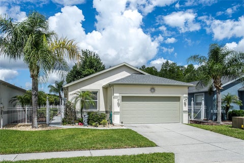 Photo of 8415 Tarocco Court, Land O Lakes, FL 34637 (MLS # TB8489308)