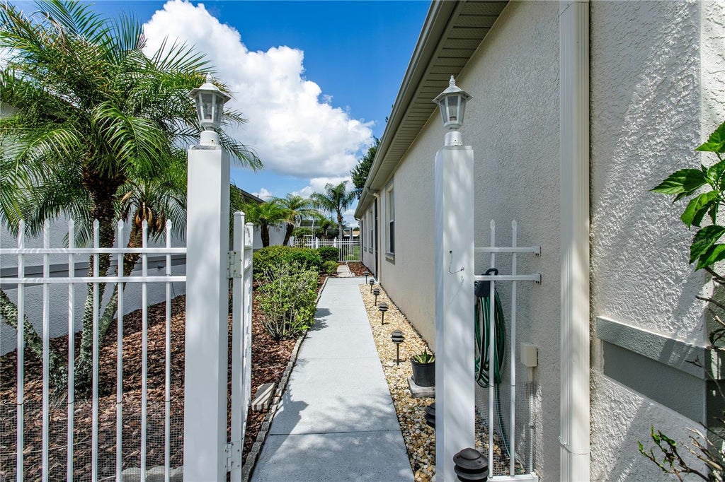 Photo of 8415 Tarocco Court, Land O Lakes, FL 34637 (MLS # TB8489308)
