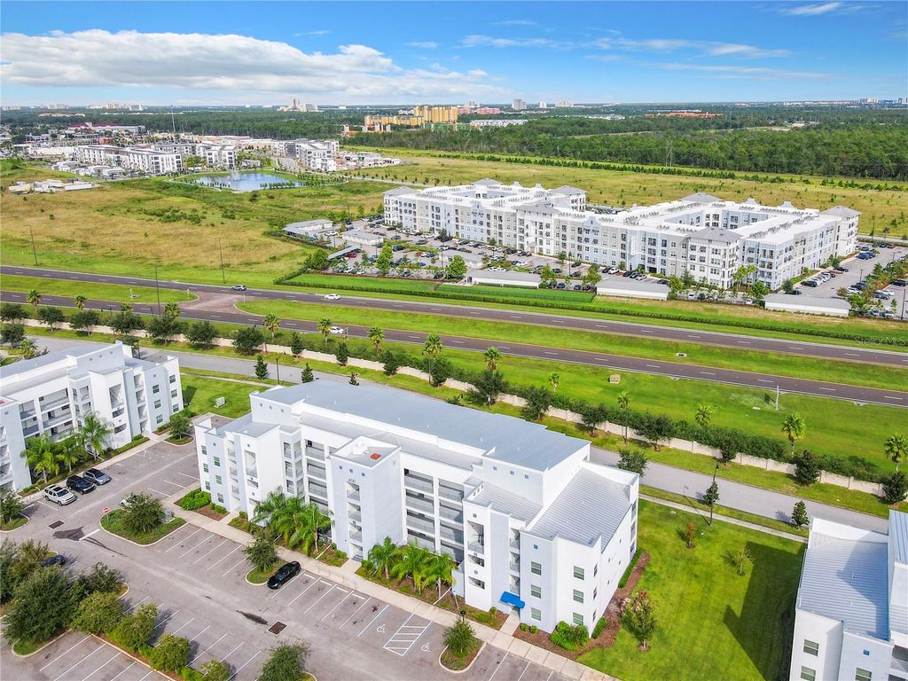 Photo of 4741 Clock Tower Drive #107, Kissimmee, FL 34746 (MLS # O6396170)