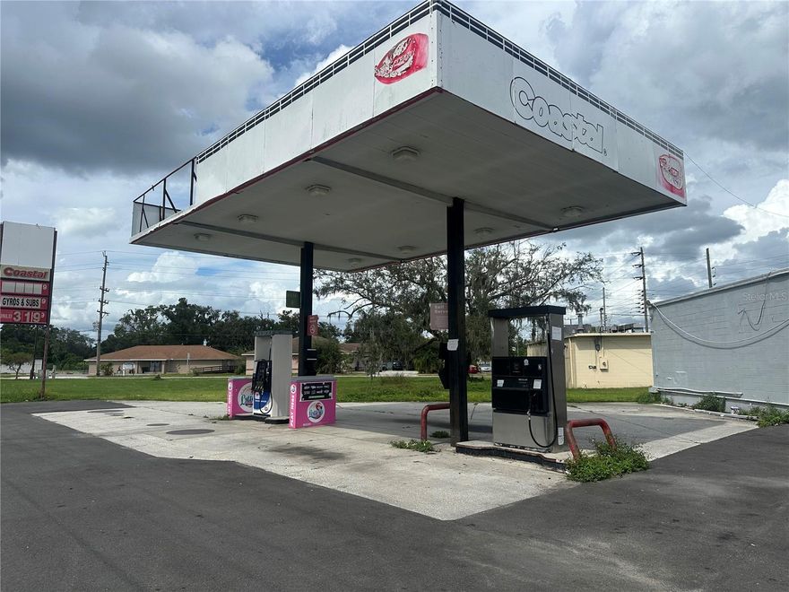 Discover a unique opportunity to own a commercial investment on a highly visible corner in Lakeland: a fully operational gas station and convenience store — PLUS an adjacent cleared and vacant lot — being offered together as one package at 1345 Kathleen Rd. This combined offering delivers approximately 0.9 acres, providing immediate income from the existing gas station while offering ample land for expansion, redevelopment, or future resale potential. The gas station features well-maintained fueling infrastructure, convenience retail facilities, and all the essentials needed for ongoing operation, creating an immediate revenue stream for a new owner. Meanwhile, the vacant lot next door presents a blank canvas — ideal for additional parking, a car wash, a quick-serve restaurant, a retail annex, or any complementary commercial use, subject to city approval and zoning allowances. Situated on a heavily traveled stretch of Kathleen Rd, this property commands strong visibility and easy ingress/egress, making it attractive to both commuters and local residents. The combined acreage and strategic layout give flexibility rarely found in single-lot offerings — whether you’re looking to consolidate operations, diversify revenue streams, or position yourself for long-term appreciation in this growing Lakeland market. This is a rare chance to acquire not just a single business and parcel, but a multi-faceted commercial footprint — a full-service gas station plus prime land for future growth — all in one transaction. Buyers are encouraged to perform their own due diligence regarding zoning, environmental assessments, and utility access, but the foundational elements are in place for a smooth transition or ambitious redevelopment. Don’t miss this unique offering that combines stable income potential with real estate upside in one of Lakeland’s most accessible commercial corridors.