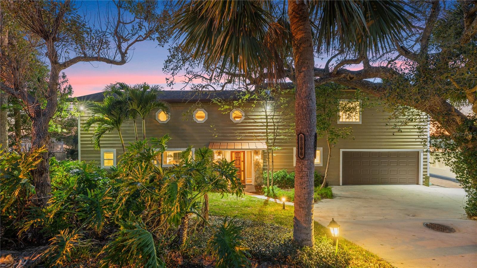 Live where every day feels like a vacation—right on the Halifax River!
Nestled directly on the Halifax River, 2306 John Anderson Drive is a rare Intracoastal gem offering timeless charm, modern comfort, and front-row seats to some of the most spectacular sunsets in all of Ormond Beach.
This spacious 4-bedroom, 3-bathroom home spans nearly 2,900 square feet, with large, light-filled living spaces designed to celebrate the water view from nearly every angle. The soaring ceilings, rich wood finishes, and a stone fireplace create a warm and welcoming interior, while newer windows and doors frame the ever-changing colors of the river at dusk.
The heart of the home is the open-concept kitchen with granite countertops, seamlessly connecting to the living and dining areas for effortless entertaining. The expansive primary suite is a true retreat, featuring private balcony access, breathtaking water views, and room to relax and recharge.
Outside is where the magic really happens. A large private dock, covered boathouse, 6000 lb. boat lift, kayak cradle, and davits for a second vessel make this a dream setup for any water lover. Whether you're fishing, cruising, paddling, or simply sitting with a glass of wine, the sunsets from this dock are nothing short of unforgettable.
Additional features include a spacious garage, circular driveway, and no HOA. Located just minutes from Ormond’s beaches, boutiques, and restaurants, this property delivers the perfect blend of privacy, lifestyle, and convenience.
2306 John Anderson Dr. is more than just a home—it’s a place to slow down, soak in the view, and fall in love with every sunset.
Square footage received from tax rolls. All information recorded in the MLS intended to be accurate but cannot be guaranteed.