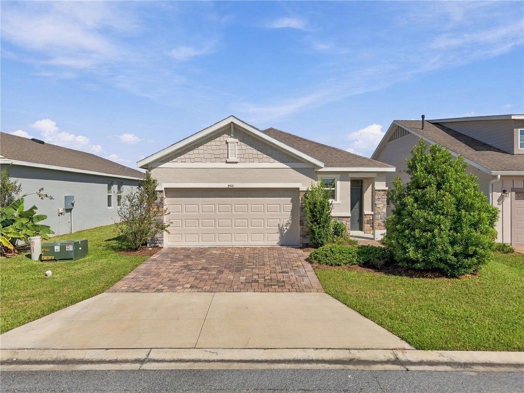 Photo of 5541 NW 40th Loop, Ocala, FL 34482 (MLS # OM734120)