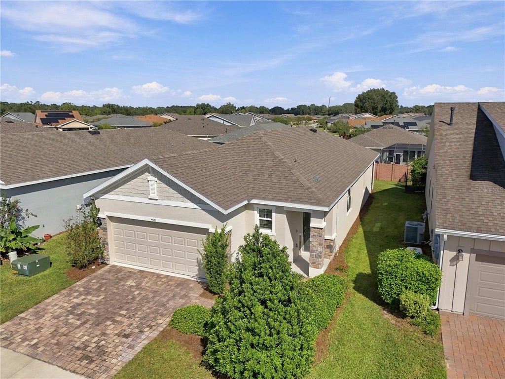 Photo of 5541 NW 40th Loop, Ocala, FL 34482 (MLS # OM734120)