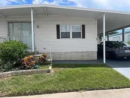 55 and older Best loc pool clubhouse lake activities 230$ month and you own the lot! Near downtown honeymoon i pl harbor downtown near curlew and 19 water landscaping garbage pick up included HOA payment! Back on market reduced for final this unit is 60000 less then the lowest price unit up to 219 k some comps are 229 across street all original carport washer dryer firm price.