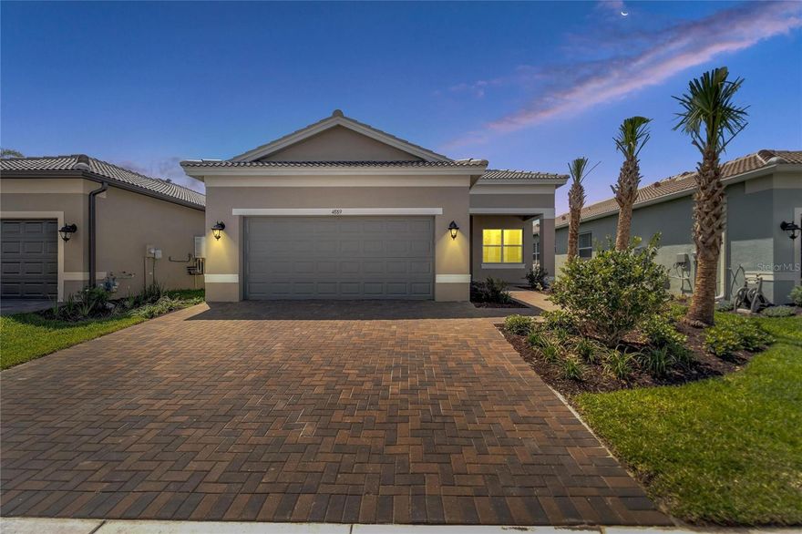 Your Florida home awaits! Amazing opportunity!  BRAND NEW Home for YOU!  Be the first to live in this stunning home in DEL SOL! Come see why everyone is moving to this luxury 55+ community. Great layout with three bedrooms, 2 baths, ALL tile floors, upgraded kitchen and bright and open living areas.  Conservation LOT with lovely waterview - Enjoy this outdoor space with an extended screened lanai and a pavered patio. You will feel the openness when you walk in. Bright and Open Great Room with a slider leading to the lanai offers lots of natural light. The Chef of the house will love the upgraded Kitchen with gas stove, two toned cabinet colors, lots of storage space, stainless steel appliances, walk-in pantry, space for bar stool seating and a sunny dinning nook overlooking the water view in the back.  Three way split in with the bedrooms makes for easy living.  Bedroom 3 has double doors and could be a great spot for your home office. Spacious Master Suite with large bedroom, two closets, two sinks, plenty of counter space to get ready in the mornings and a nice shower.  All of this in the popular Valencia De Sol community.  Gated and premier 55+ living.  State of the art amenities and events to keep your calendar full! 
Dazzling 25,000 square foot Clubhouse with a resort-style pool, on-site café with indoor and outdoor seating, grand social hall, variety of racquet sports courts, dog park and more, Valencia del Sol has it all. There’s no better place to live the ultimate 55+ Florida lifestyle.  Location is between Tampa and Sarasota for you to enjoy the perks of both cities and events.  Plus the famous sunny beaches of Florida.  Come see this house today and be the FIRST to make it a home!