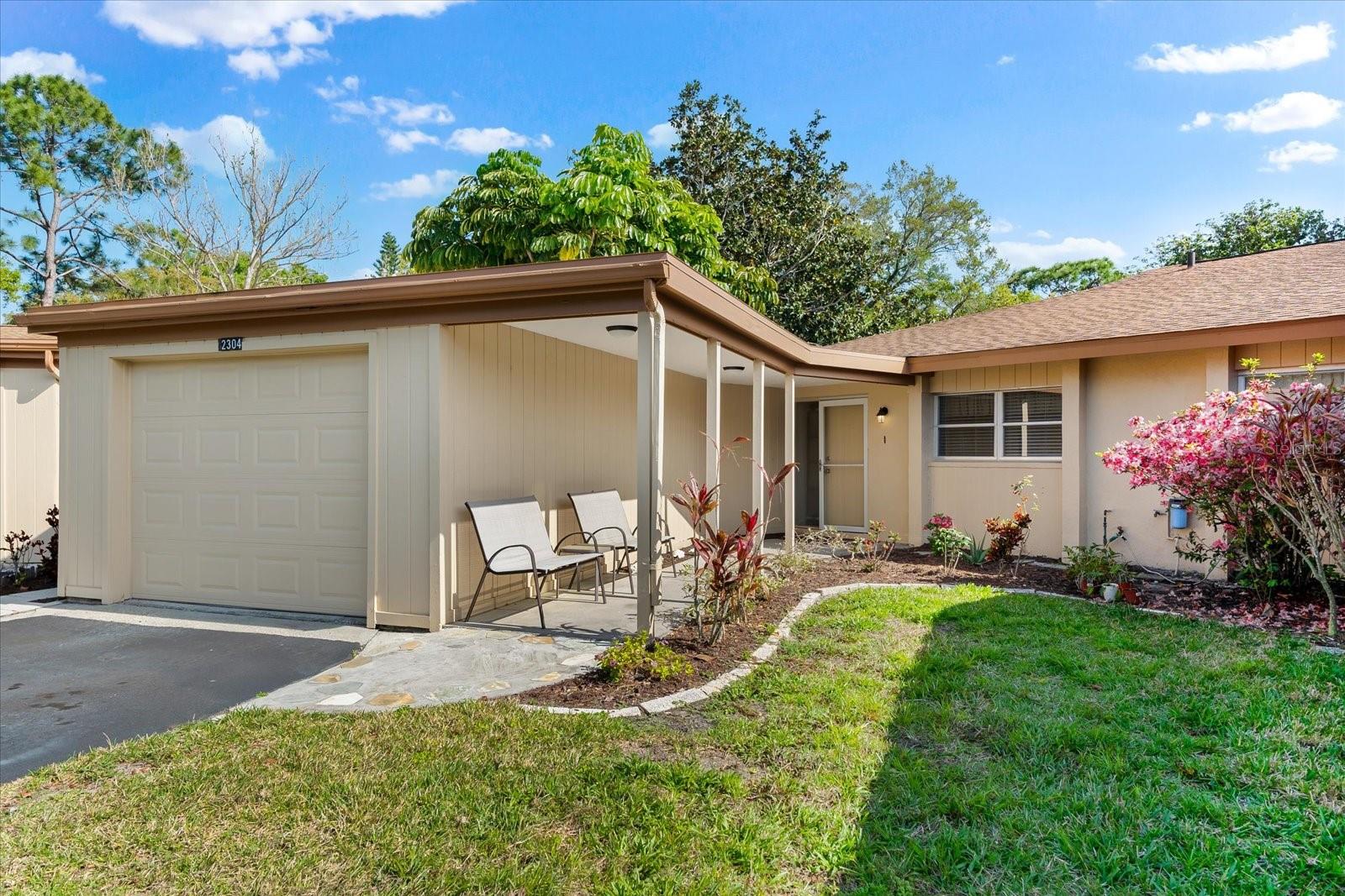 FURNISHED ANNUAL LEASE offered in Woodside South located in Sarasota, Florida. Welcome Home! This two- bedroom single story villa is sparkling clean and located in a picturesque tree-lined neighborhood just four miles to Siesta Key. The time is now to enjoy carefree Florida living in a friendly community with blooming flowers, steps to the pool, and minutes to shops, restaurants, medical facilities, gyms, and the local Gulf Gate library. An ideal neighborhood for walking outdoors, feeling inspired by the wide-open green spaces, and relaxing at the community pool located within convenient proximity to your new home. This wonderful single-story villa offers a private covered entry, an attached garage, washer, dryer, and is completely furnished and turnkey. Water and cable are included in the rental price and the Internet is just an additional 30.00 per month. Perfect opportunity for an individual relocating to Sarasota wanting to take their time to purchase or build a home with flexible rental options. Available starting September 1, 2025