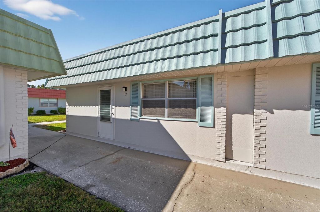 Photo of 1802 Bedford Lane #12, Sun City Center, FL 33573 (MLS # TB8469208)