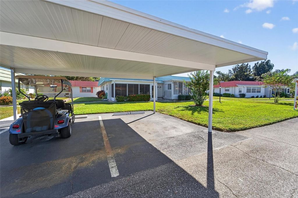 Photo of 1802 Bedford Lane #12, Sun City Center, FL 33573 (MLS # TB8469208)