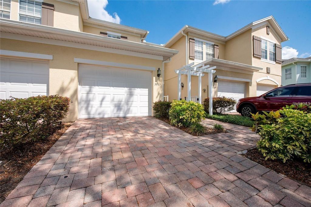Photo of 5957 Strada Capri Way, Orlando, FL 32835 (MLS # O6384990)