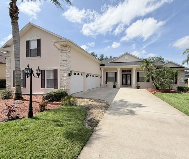 Photo 1 of 74 — 725 CITRUS WOOD LANE, VALRICO, FL 33594
