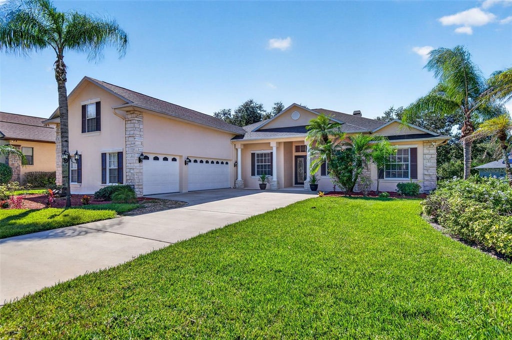 Photo of 725 Citrus Wood Lane, Valrico, FL 33594 (MLS # TB8557245)