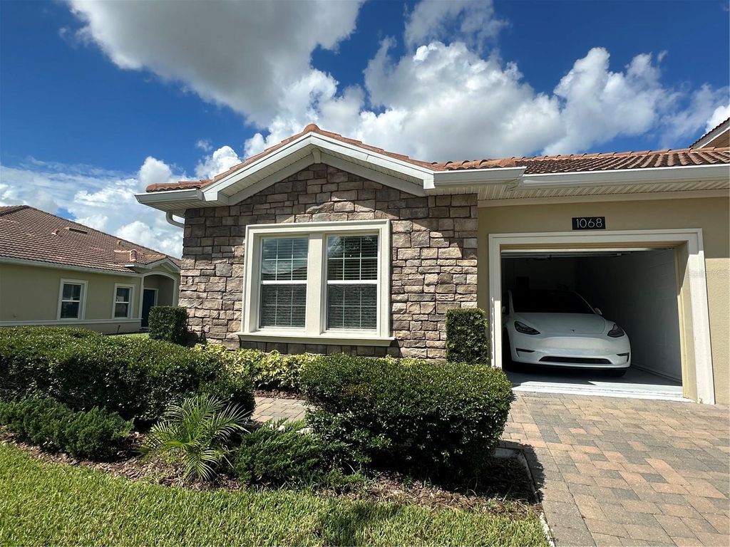 Photo of 1068 Quaker Ridge Lane, Davenport, FL 33896 (MLS # O6331701)