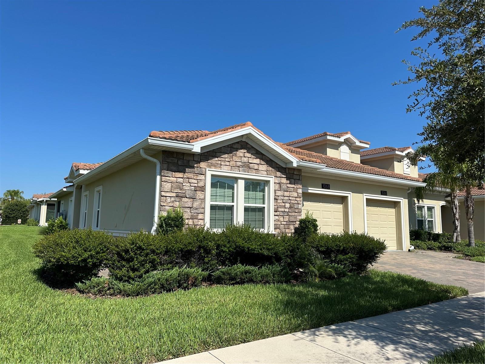 Attractive Price, Sincere Sale! Don’t miss this stunning villa situated on a gorgeous corner lot in the beautiful Champions Gate community! This immaculately maintained, 2-bedroom, 2-bathroom home boasts an open-concept layout, plus a versatile flex room that can easily be converted into a third bedroom, home office, home theater, game room, gym, or whatever suits your needs. When you approach this breathtaking property, you’ll be captivated by the beautifully landscaped surroundings—all meticulously maintained by the Homeowners' Association.
Luxury Living in A Premier Master-Planned Community This exceptional community offers unparalleled amenities, including:
The Oasis Club–A 16,000-square-foot state-of-the-art facility featuring: full-service restaurant, fully equipped fitness center, 26-seat movie theater, game room, tiki bars, 1,023-foot-long temperature-controlled lazy river (with a two-story waterslide), Air-conditioned cabanas, and business center.
The Plaza Clubhouse – A vibrant social hub offering: restaurant and bar, two swimming pools, fitness center, game room, pickleball courts, and a full calendar of social activities.
The Retreat Club – A full-scale water park for endless aquatic enjoyment
Residents can conveniently navigate the community’s extensive pathways via golf carts.
World-Class Golf Experience
Indulge in an 18-hole championship golf course designed by George Clifton, with golf membership included as part of your homeowner package. The community also boasts two additional championship golf courses designed by Greg Norman. The golf practice facility offers unlimited range balls at no cost. Registered owners and their guests enjoy waived green fees, paying only a nominal cart fee.
Community Fees & Policies
CDD (Community Development District) and trash collection fees are included in the annual property tax bill. Kindly to remind that the short-term rentals are not permitted.
Comprehensive HOA Benefits
The Homeowners Association (HOA) includes: 24/7 guarded gate access, cable TV, internet, and home phone services, trash collection, bundled golf membership, full-service lawn care and landscaping, irrigation system maintenance and repairs, termite protection, on-demand exterior repainting, and long-term roof replacement.
Experience the pinnacle of Florida living in this meticulously designed community, where luxury, convenience, and recreation come together seamlessly.
Conveniently located near all Central Florida top attractions, shopping, dining, and more. This lovely home is perfect as a primary residence, vacation home, or investment property. Meticulously cared for by the original owner.
Schedule your private tour today!