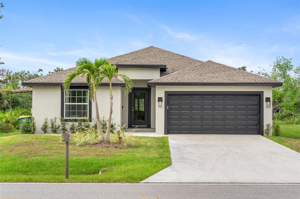 Photo of 111 Sunset Road, Rotonda West, FL 33947 (MLS # A4686328)