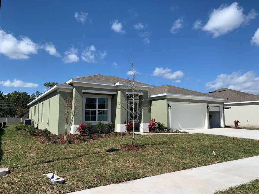 Location, Location, Location - America's Builder has arrived in Ormond Beach near Clyde Morris Boulevard and built with high end designer packages and finishes that include a GOURMET KITCHEN w/upgraded 42'' cabinets, QUARTZ counter tops, Stainless Steel appliances including stove top, wall convection wall oven, microwave, kitchen back splash tile, 12'' x 24'' wood tile staggered, 8ft doors, 3-Car garage and more! The Easton is a great split plan with foyer entry overlooking the formal dining that leads into an open living/kitchen/cafe dining combination-great for entertaining as well as an activity room and flex room.

Create the perfect retreat in the fabulous Owner's suite with pop up ceiling, HUGE walk-In closet, linen closet, luxurious garden bath, QUARTZ vanities with dual sinks and separate tiled shower with glass enclosure! Spacious secondary bedrooms throughout with great closet space in all. SMART HOME Technology and great energy efficiency features saving money - vinyl low-e glass double pane windows and much more! Relax on the oversized lanai offering triple doors in living room, double doors in breakfast room and access to a bath through side door for use when entertaining. *Photos are of similar model but not that of exact house. ;Water: City