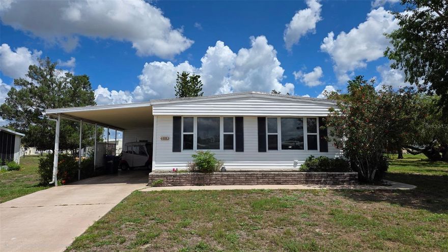 Welcome to comfortable, low-maintenance Florida living in this well-situated double-wide mobile home in the 55+ gated Holiday Park Special District. With a 2014 roof and 2018 above-ground gas system, this home is a great opportunity for affordable, relaxed living in a community built for fun and connection.

Holiday Park offers an active lifestyle with abundant amenities, including 14 shuffleboard courts, 6 horseshoe pits, 4 pickleball courts, 3 tennis courts, 3 bocce courts, 3 ping pong tables, 2 heated pools, a fitness center, billiard room, card rooms, library, ceramic building with kiln, dart room, and a laundry facility. With a monthly newspaper and tons of planned activities, there’s always something to enjoy and neighbors to meet.

Holiday Park provides both social variety and peace of mind, making it easy to stay active, make friends, and enjoy the Florida sunshine. And beyond Holiday Park, North Port itself offers a laid-back lifestyle with abundant outdoor recreation, freshwater lakes and canals, nature parks, and the famous Warm Mineral Springs nearby for year-round relaxation and wellness. Great opportunity to own a home in affordable Holiday Park, North Port FL. LOW maintenance/recreation fee included in the property tax bill annually at $2,340.00, NO HOA and NO CDD fees! Spacious double wide home sited on a pie shaped cul de sac lot. Home with 3 bedroom 2 full baths. Large living room with built in shelving and large cabinet storage space. Large eat in kitchen with kitchen island. Enjoy the Florida room off the kitchen. Large hall full bath with tub/shower and many cabinets. Exterior door to a full screened cage. Large Primary bedroom with full bath with beautiful tile and stone flooring shower. Many closets in bedroom. Extra long carport and storage shed for more storage. Many possibilities with this large home. Schedule your private showing today! Come check out this spacious home!

Just a short drive to Gulf beaches, shopping, dining, and major roadways, this home brings together convenience, community, and classic Florida living — don’t miss this special opportunity.