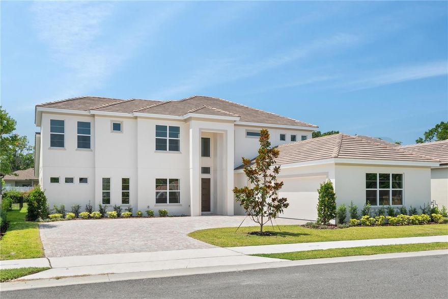 The Brantley, a former Grand Prize Winner of Orlando’s Parade of Homes, was designed with today's trendsetter in mind, offering a contemporary aesthetic and exceptional functionality. This stunning home features an open-concept family room seamlessly connected to a modern, up-to-date kitchen, perfect for entertaining. On the main floor, you'll find a spacious master suite, an office or den, both a formal dining room and a separate breakfast nook, a convenient pool bath, and a large mudroom and utility room. Upstairs, the home boasts three additional bedrooms, two bathrooms, a loft, and a generously sized laundry room. The extended and extra-wide catwalk, along with the staircase, is framed with sleek glass railings, allowing natural light to flow through the home’s expansive windows—an unmistakable hallmark of W-J Homes’ designs. Built with only top-of-the-line products, this home includes two tankless hot water heaters, custom wood shelving in closets, epoxy-coated garage floors, and many more luxury upgrades. W-J Homes sets itself apart with contemporary designs and superior materials that elevate the home beyond the traditional Mediterranean style found in the area. This home is a must-see for buyers looking for exceptional craftsmanship and modern elegance.