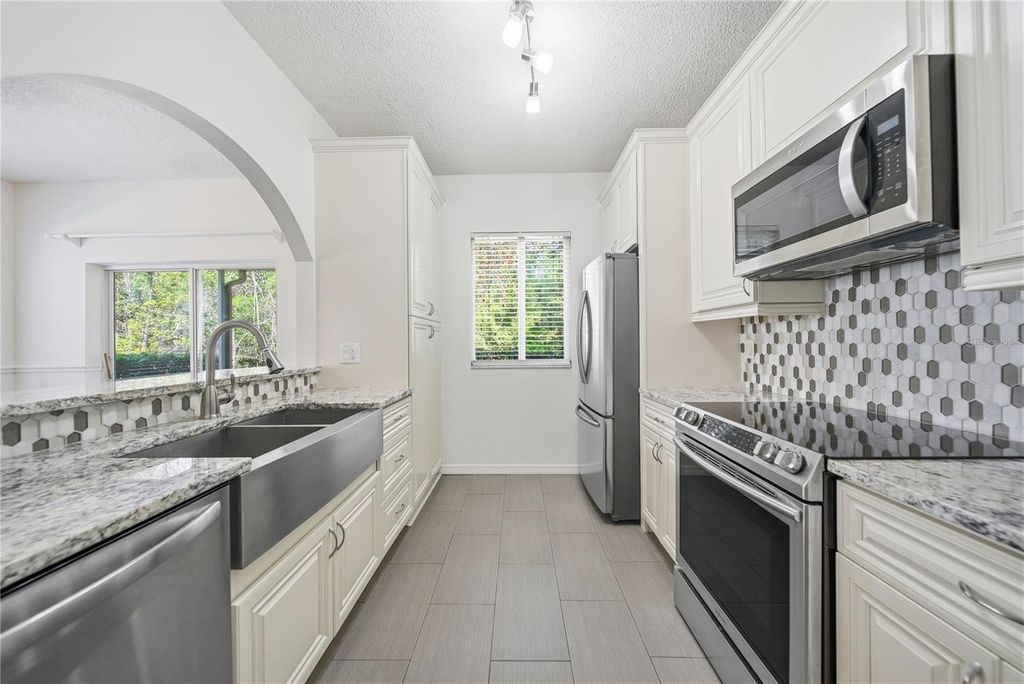 Photo of 18117 Paradise Point Drive, Tampa, FL 33647 (MLS # TB8503202)
