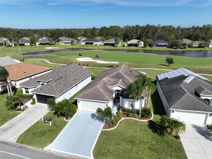 Enjoy golf course frontage in this beautifully maintained 2-bedroom + den, 2-bath home with a 2-car garage, located in the desirable 55+ gated community of Tampa Bay Golf & Country Club. A new roof (2024) and new stainless steel appliances provide peace of mind. The home features hardwood floors throughout most areas, with tile in the kitchen and bathrooms for easy care. The open living and dining area boasts two large sliders that lead to an oversized screened lanai overlooking the 11th hole, complete with a built-in grill. The primary suite offers private lanai access, dual closets, and an ensuite bath with dual sinks and a walk-in shower.
HOA fees include cable, internet, and lawn care, making maintenance simple. Residents enjoy resort-style amenities including an on-site pub and restaurant, 18-hole championship golf course, 9-hole executive course, tennis and pickleball courts, swimming pools, and a fitness center. Experience active adult living at its finest—schedule your private showing today!